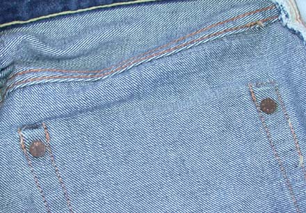 inside jeans showing hidden rivets, a good indicator of Double X.