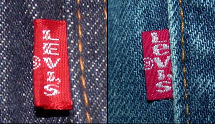 On left, vintage levi red tab with capital E, on right newer levi red tab with lower case e.